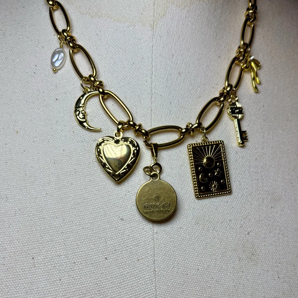 Gold Charm Necklace with Red Pendant - Image 2