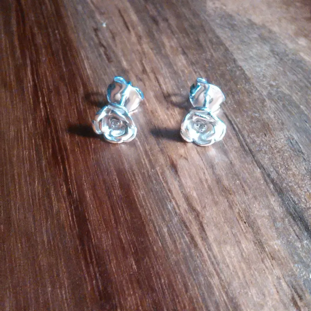 Diamond Accent Sterling Silver Floral Design Stud Earrings - Image 9