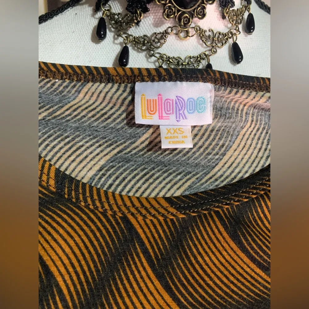 Lularoe Irma Black Orange Swirl Top - Image 9