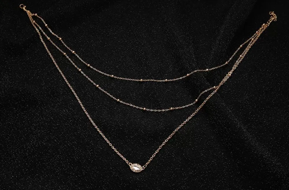 Multi Layer Gold Beads & Charm Necklace - Image 7