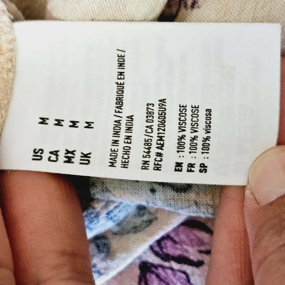 American Eagle Blush Floral Surplice Bell Sleeve Belted Romper Size Medium - Image 7