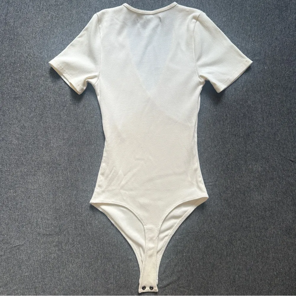 Short-Sleeve Wrap Bodysuit in Cream - Size X-Small - Image 8