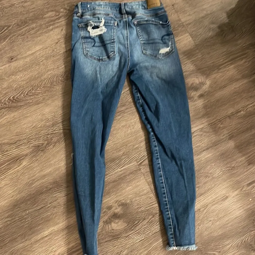 size 6  high rise distressed jegging - Image 94