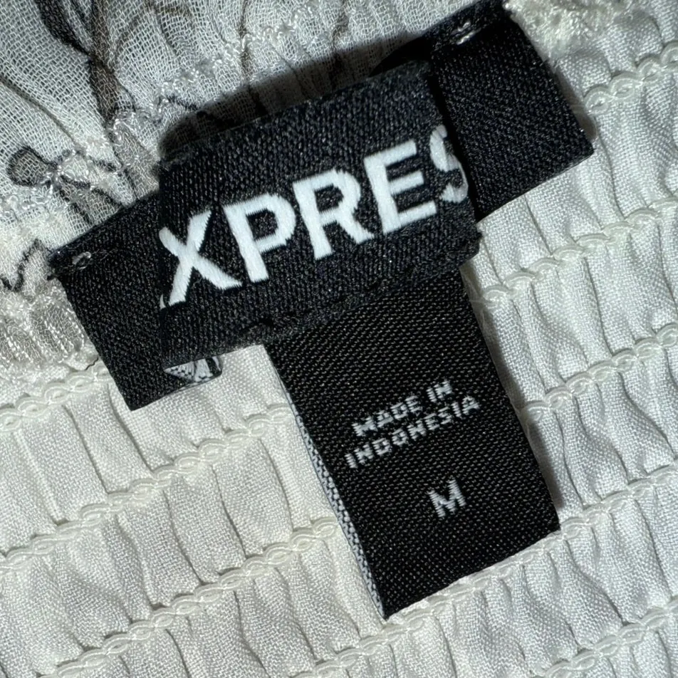 smocked bodice ruffled short puff b/w floral off shoulder crop top Express - Image 2