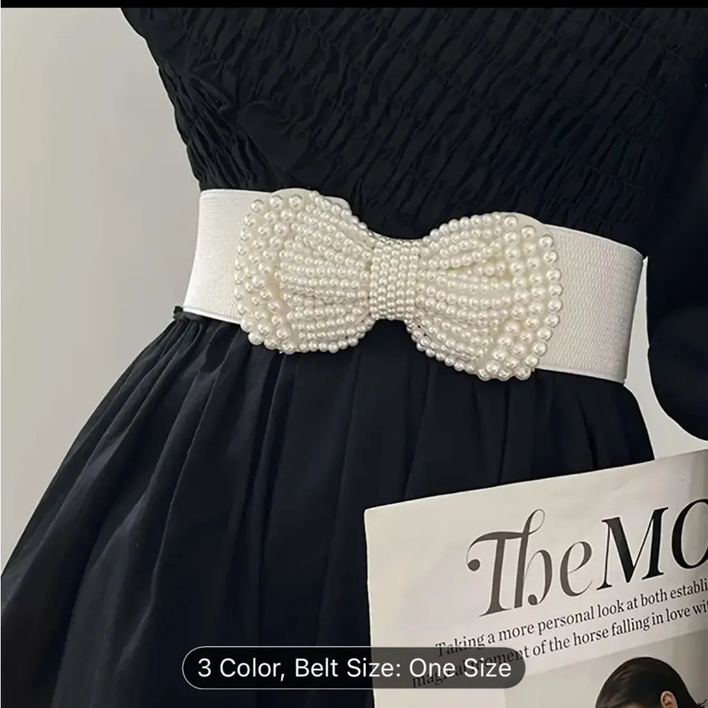 An elegant solid colored elastic waistband with a wide imitation pearl bow Red - Image 5
