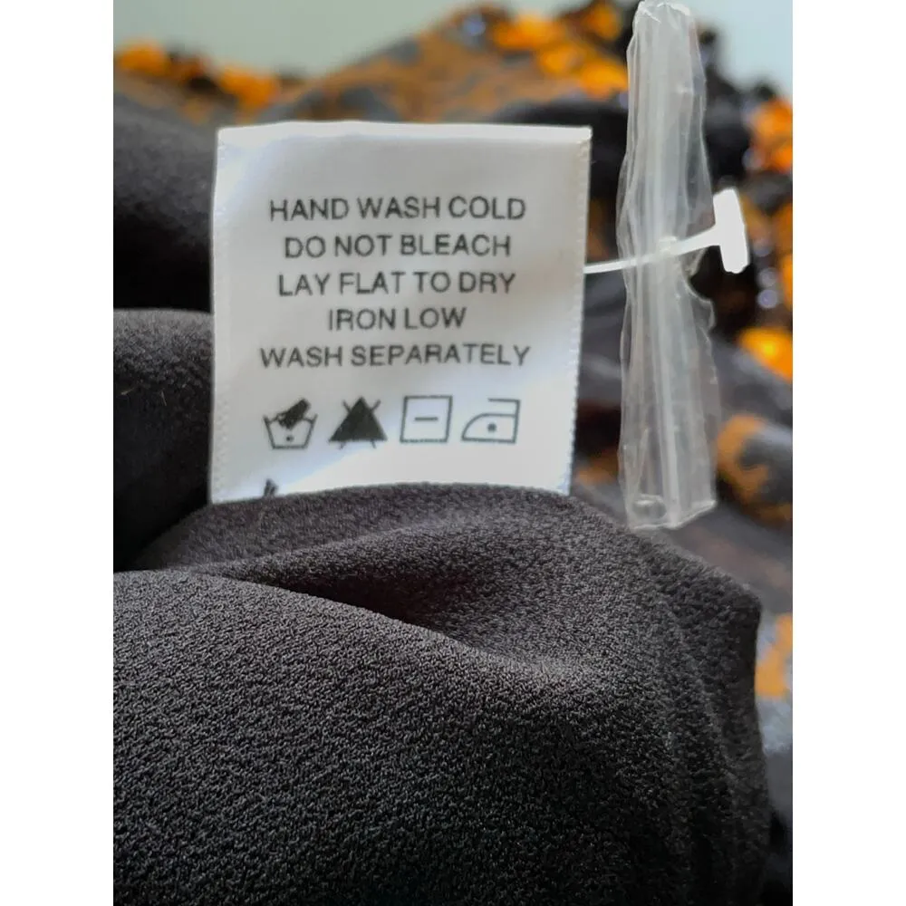 NBD Edie Animal Print Textured Ruffled Lace Up Front Peplum Top Size XS - Image 10