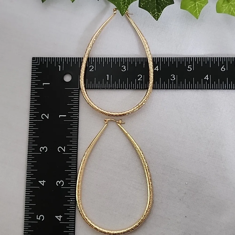 Large Gold Teardrop Hoop Earrings - Image 7