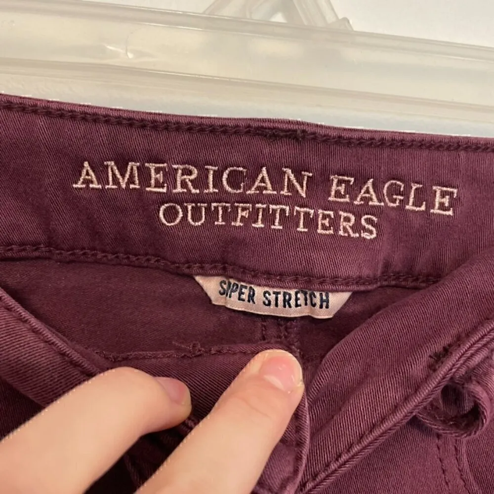 AMERICAN EAGLE Super Stretch Hi-Rise Shortie Burgundy Maroon Red Raw Hem Shorts - Image 7