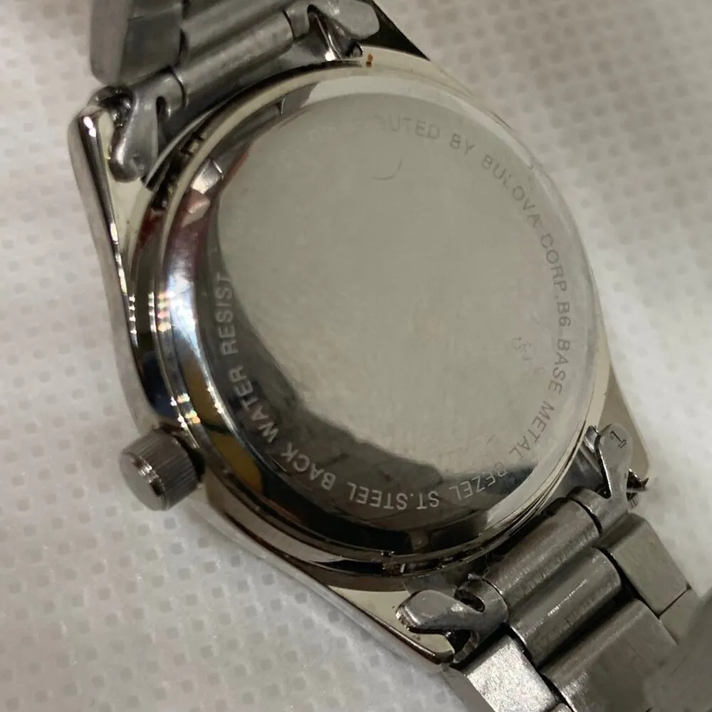 TFX by Bulova women silver tone date quartz analog watch white dial 26mm running - Image 6