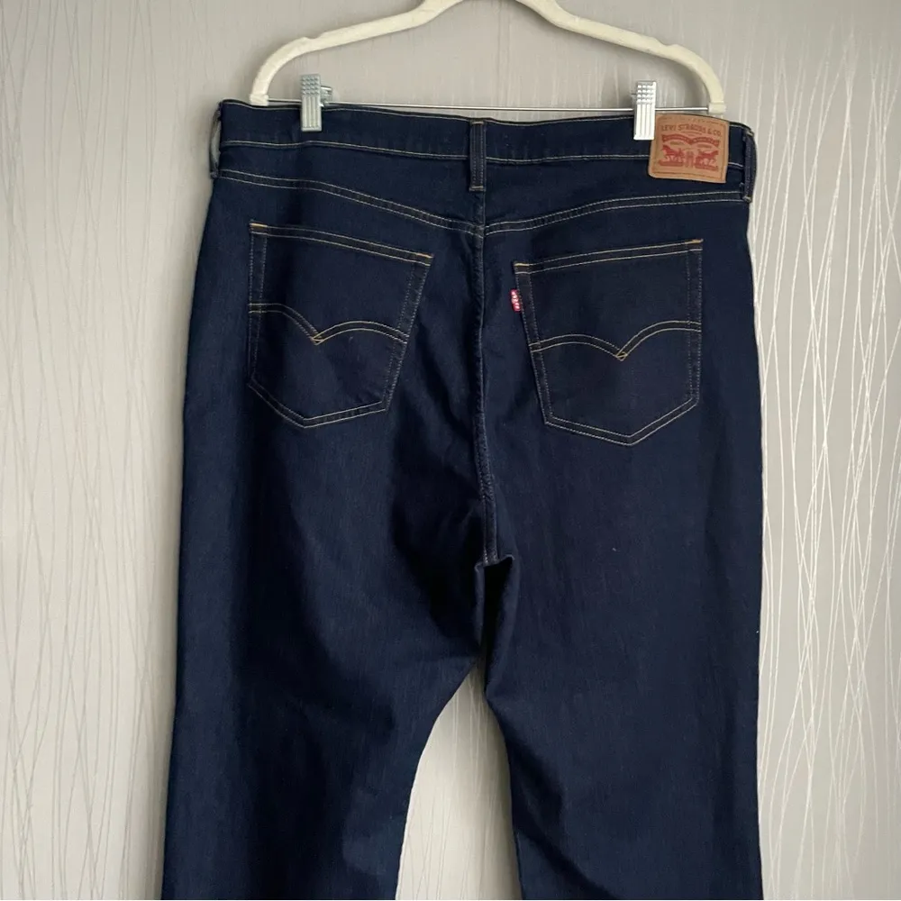 Levi’s Women's Plus Size 724 High-Rise Straight Jeans Size 18W Short Dark Wash - Image 9