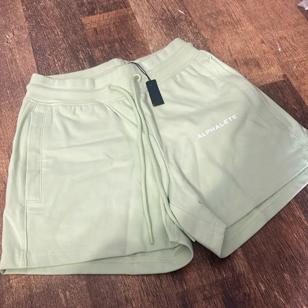 Alphalete Women's Essential Core Athletic Shorts GREEN - Image 4