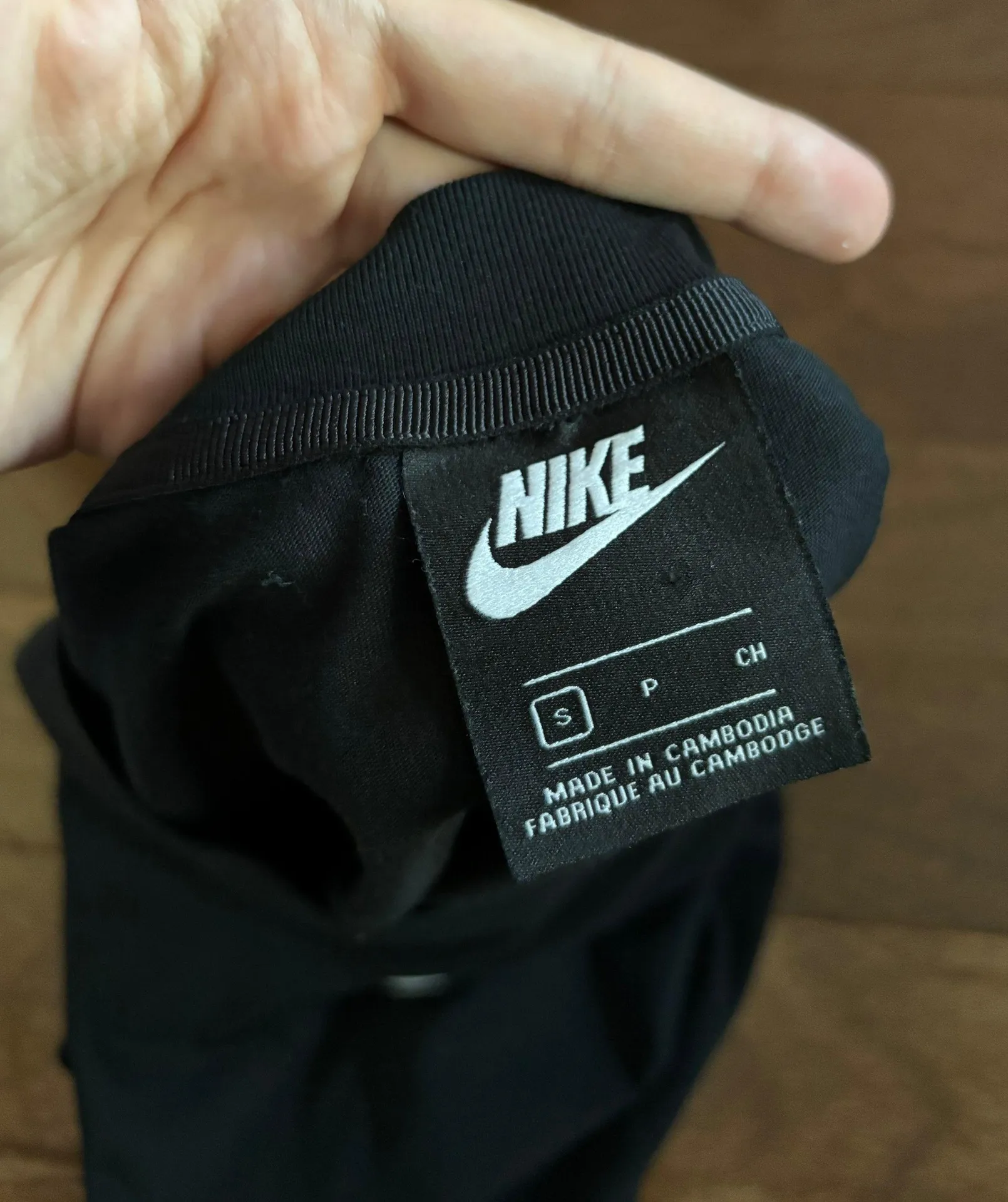 women’s black cropped tee with white swoosh - Image 3