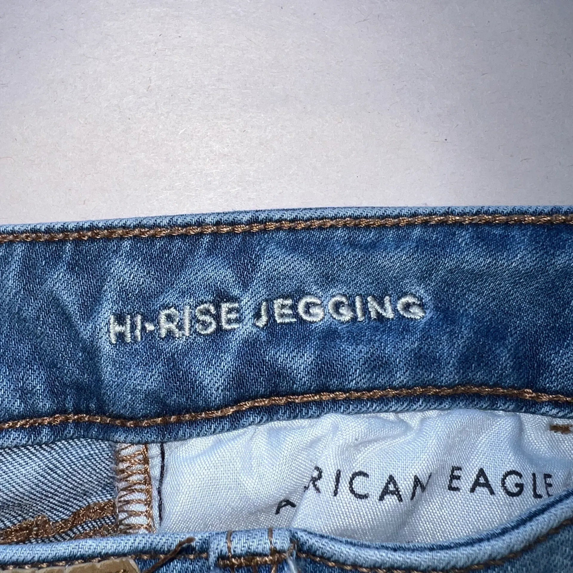 American Eagle  - AEO Light Wash Distressed Super Stretch Hi Rise Jegging Jeans - Image 7