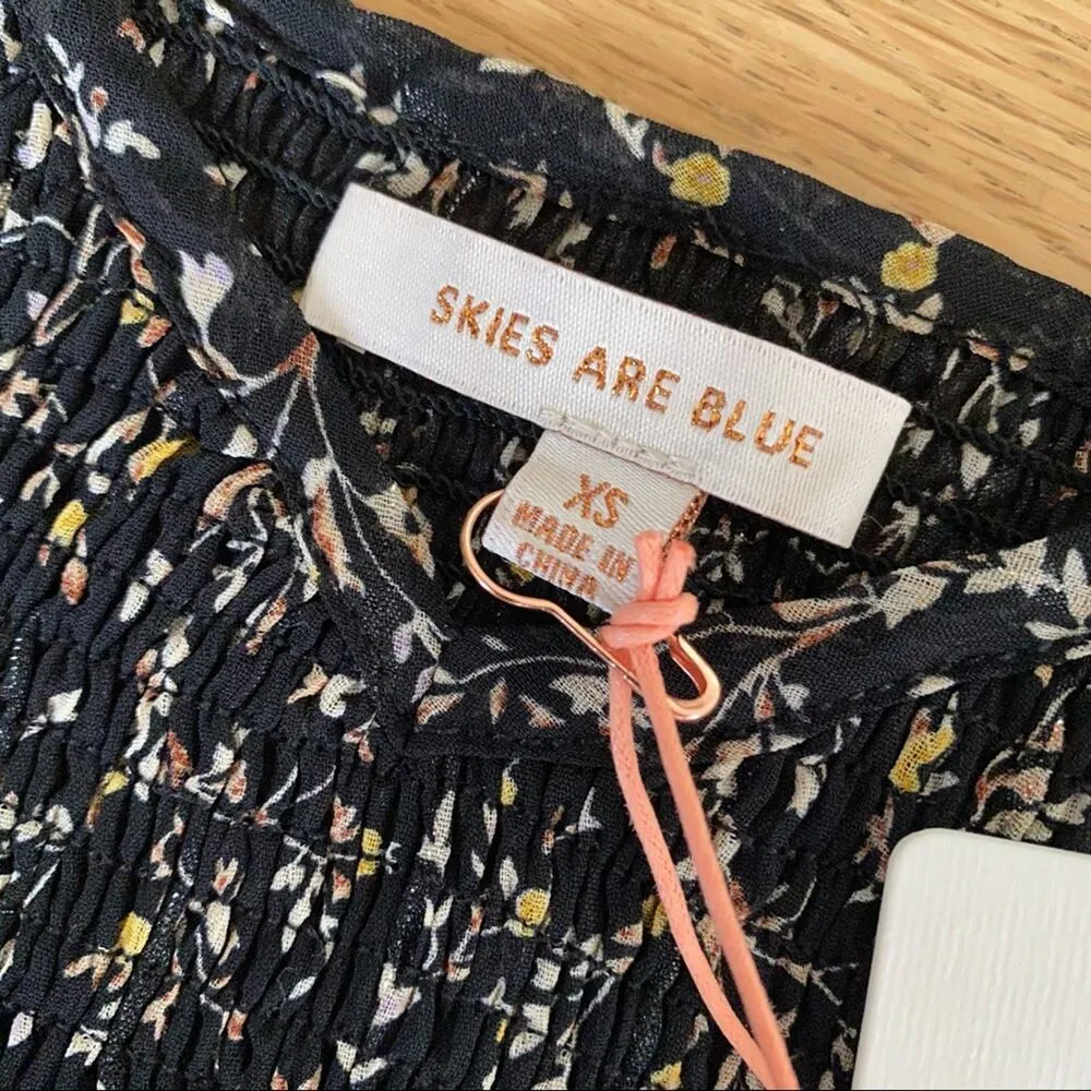 Skies Are Blue Ditsy Floral Smocked Mini Dress in Black - Image 3