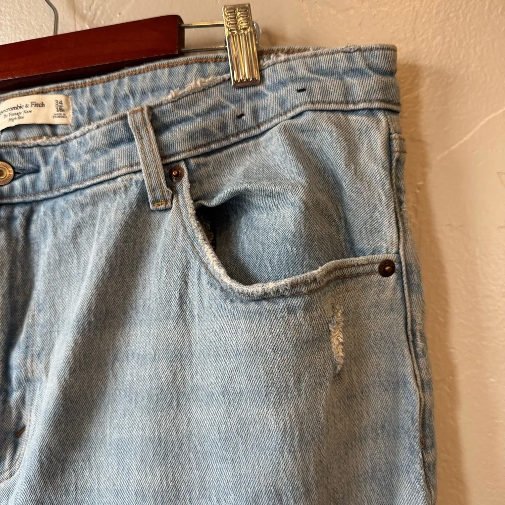 Abercrombie & Fitch Curve Love High Rise Vintage Flare Jeans in Light Wash - Image 8