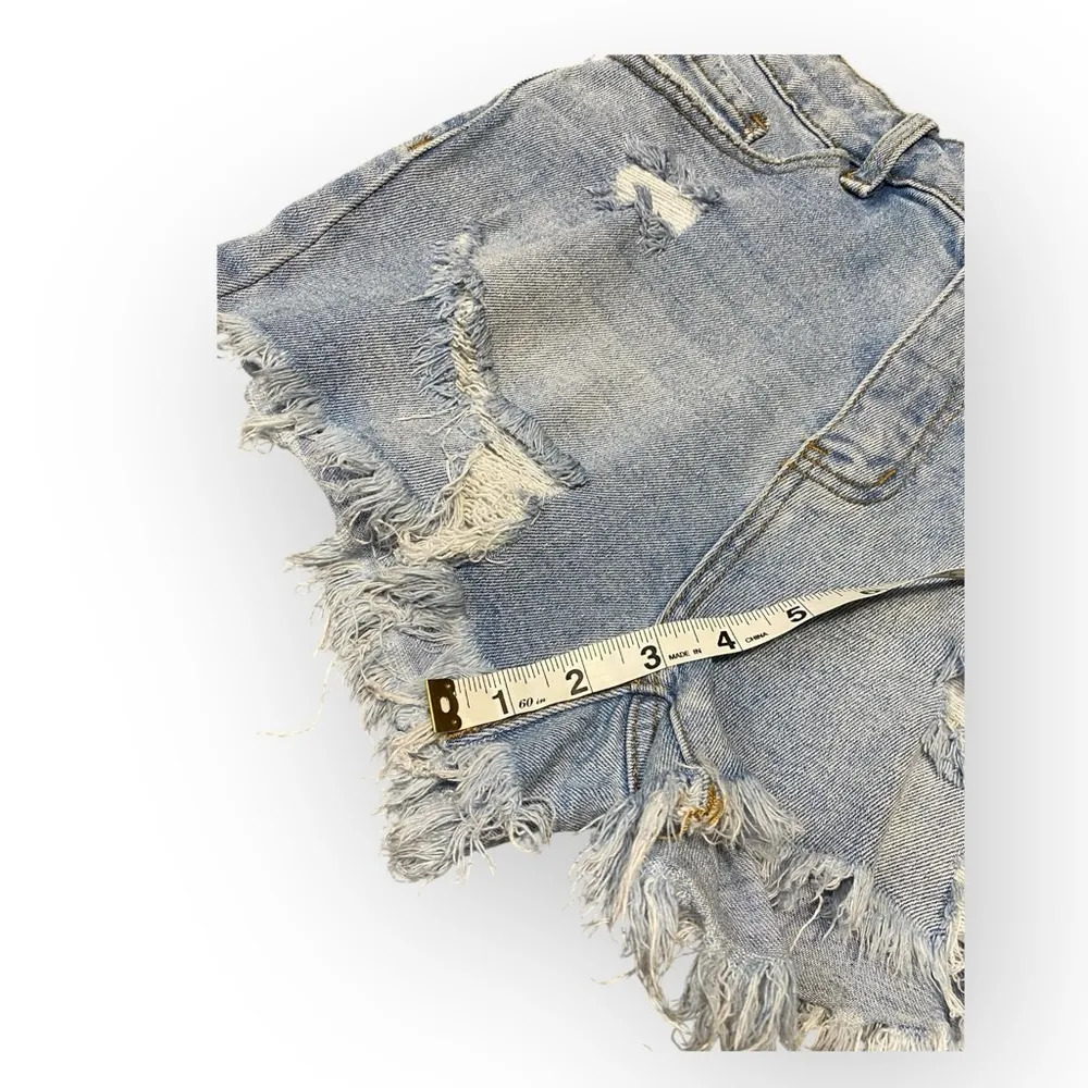 KanCan Women’s Medium High Rise Distressed Jean Shorts Light Wash Frayed Hem Blue - Image 5