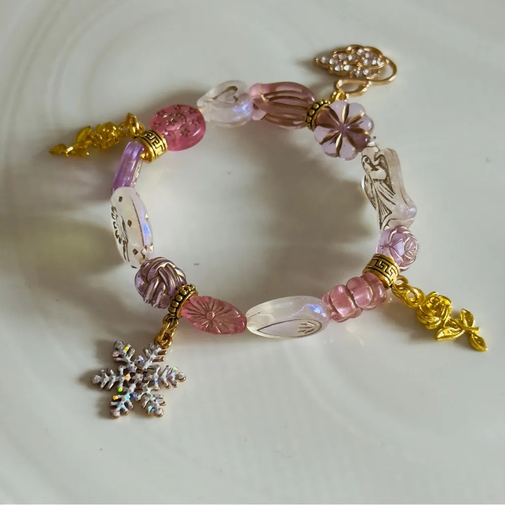 Elegant Pink and Gold Charm Bracelet - Image 3