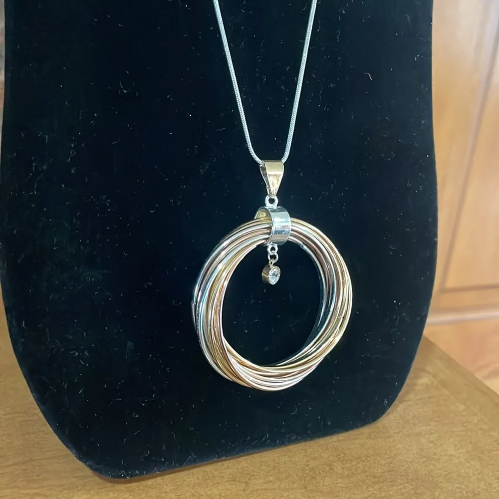 J Lo Silver tone Necklace with multi loop Circular Pendant and rhinestone accent - Image 3