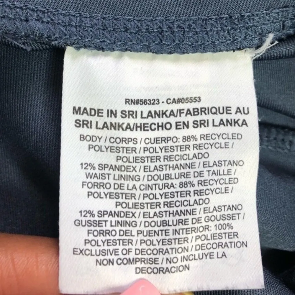 Nike Women’s Athletic Mid-Rise Logo Front Capri Tights - Image 5