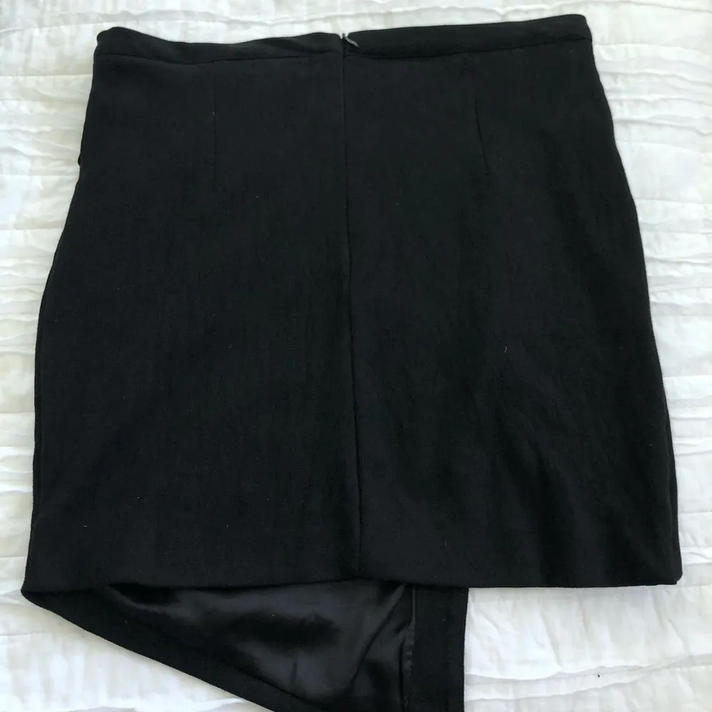 Blush Boutique Black Suede Asymmetrical Skirt - Image 4