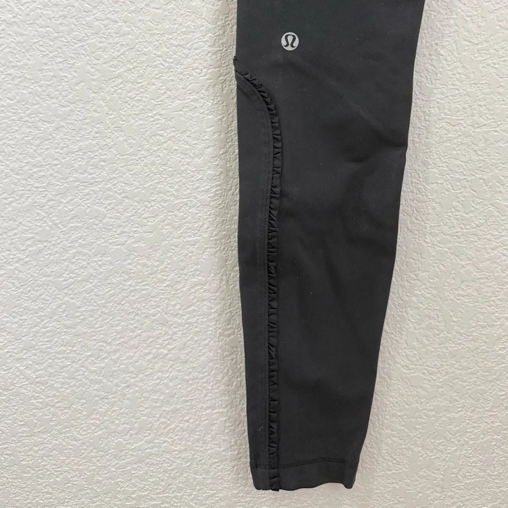 LULULEMON Athletica Black Dressage Pant Ruffled Ankle Zip Leggings Size 6 - Image 8
