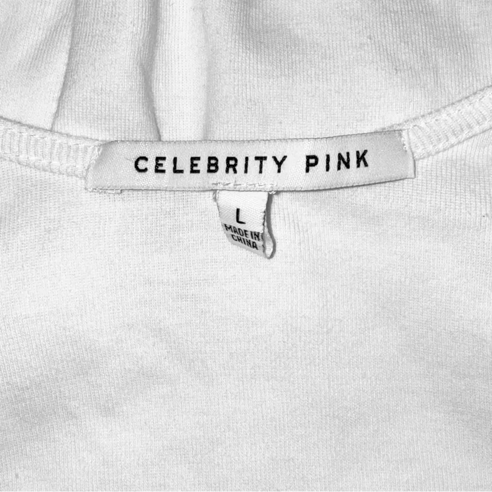 Celebrity Pink Large Flutter Sleeve White Body Suit - Image 3