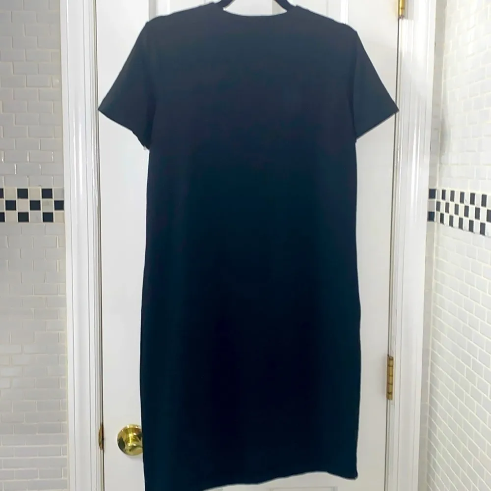 Danskin black shirt sleeve v neckline dress. Nylon/ lycra/Spandex. Size PS. NWOT - Image 5
