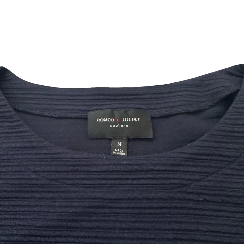 Romeo & Juliet Couture "Peek-A-Boo" Navy Textured Sweater with Plaid Panel - Image 5