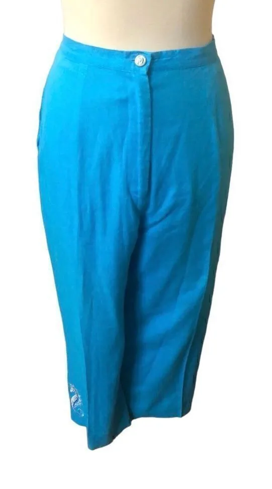 Bob Mackie Wearable Art turquoise pants with seahorse embroidered on right leg - Image 1