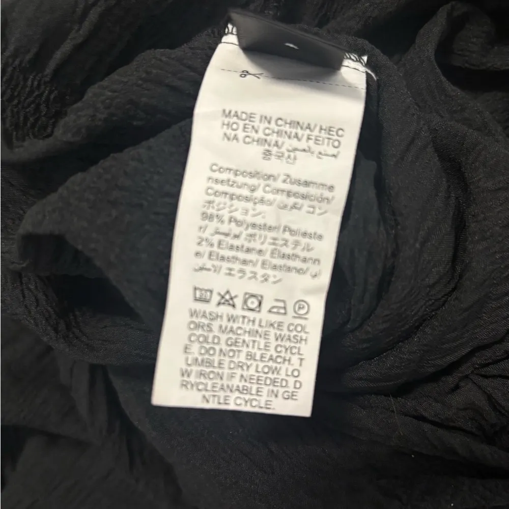 Black lightweight jumpsuit size small chest is 15 inseam is 27 - Image 3