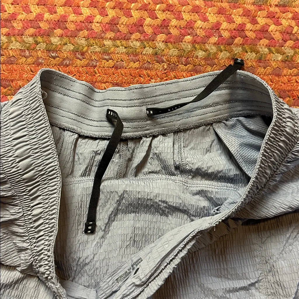 NIKE BLUE TEXTURED LIGHT WEIGHT PULL ON JOGGER PANTS - Image 9