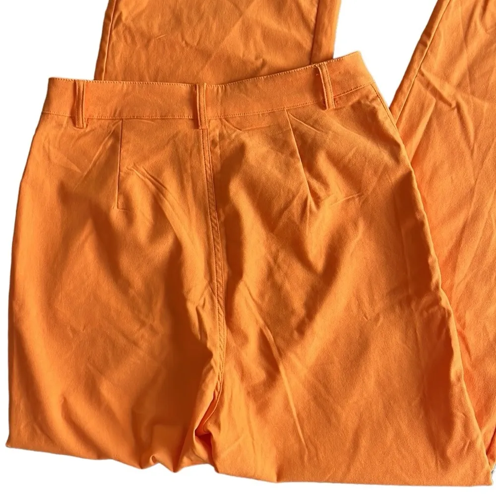 SheIn  orange pants with hip cut out - Image 13