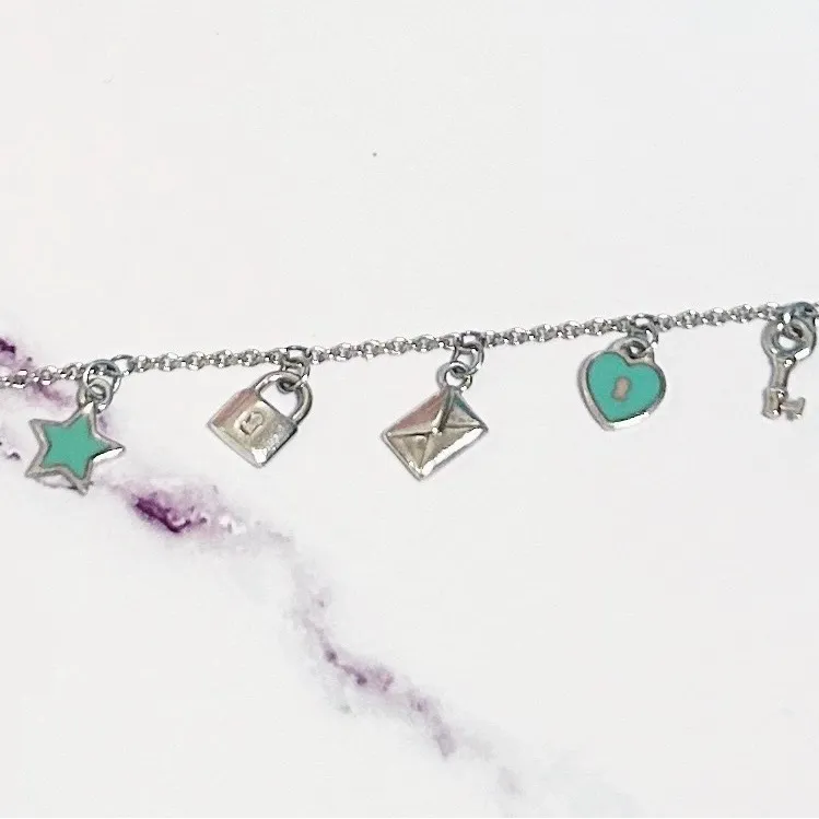 Authentic Tiffany & Co. RARE Mini Love Notes 925 Sterling Silver Charm Bracelet - Image 3