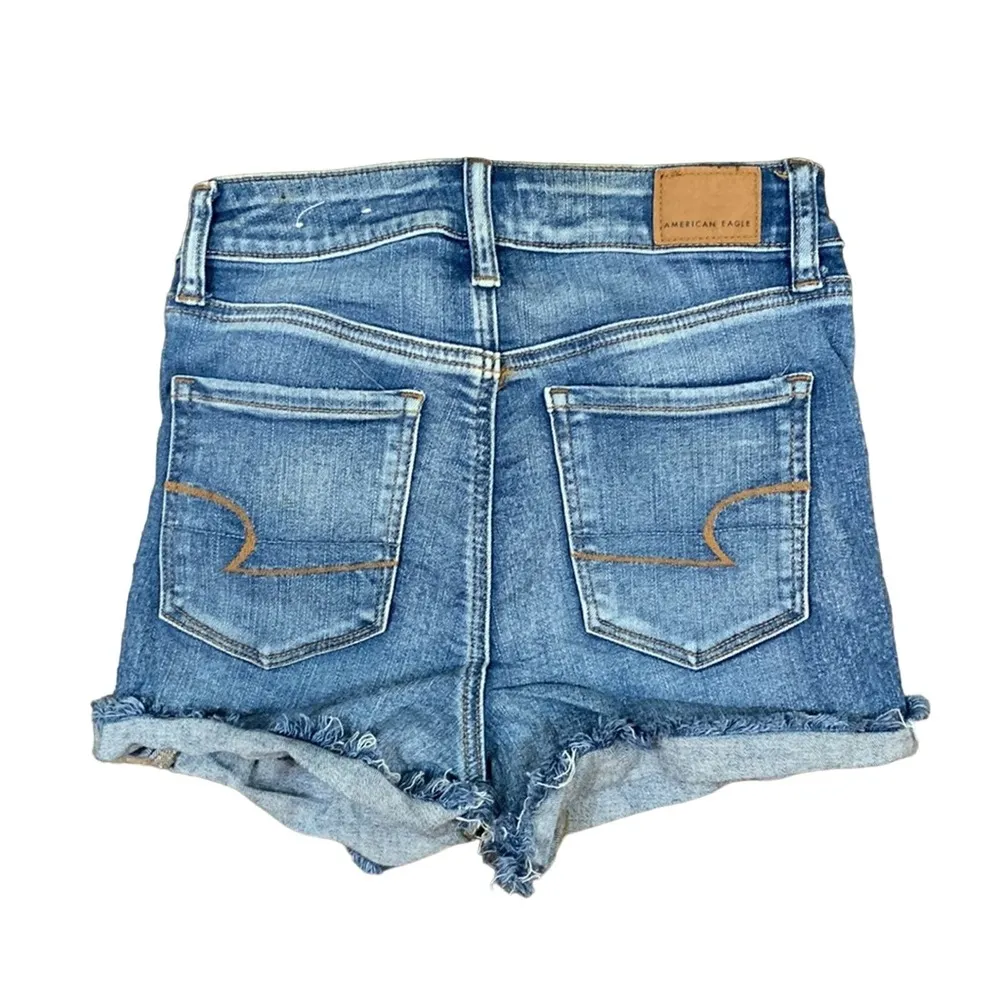 American Eagle Next Level Stretch Hi-Rise Shortie Distressed Jean Shorts - Image 6