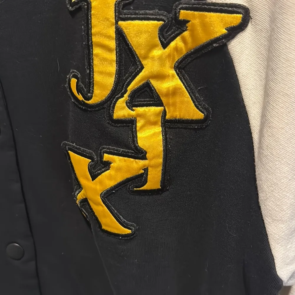 Black and Cream Varsity Jacket with Gold Lettering - Image 2