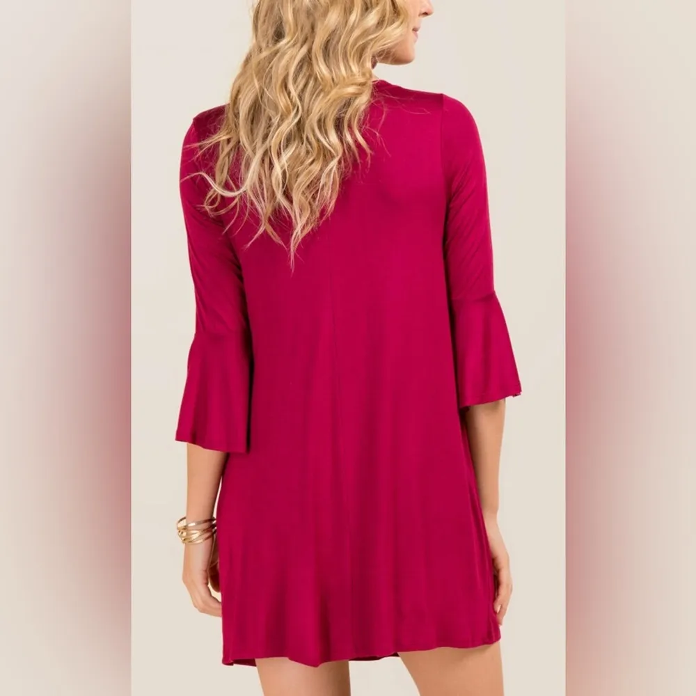 Francesca’s Alya Wine dress with bell sleeves size small - Image 3