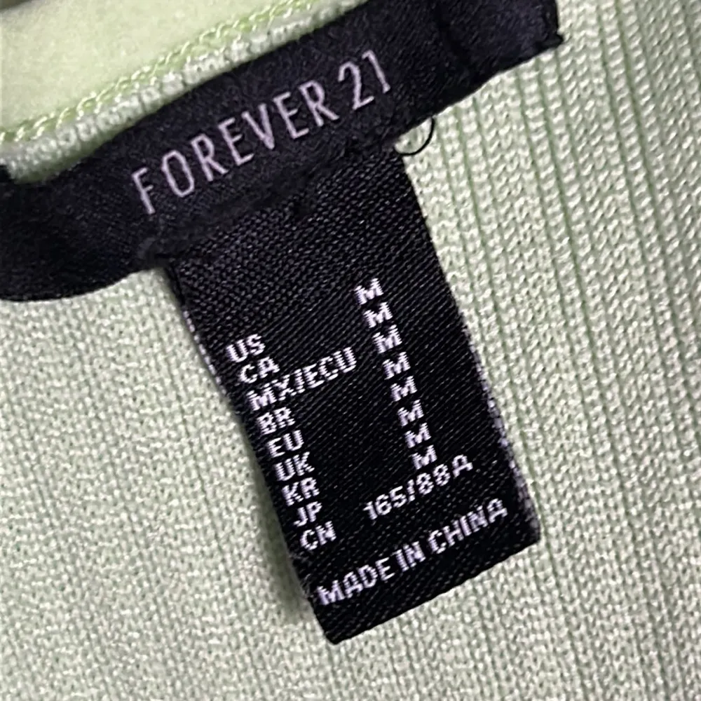 Forever 21 Sleeveless Ribbed Bodycon Mini Dress with caged Deep V-Neckline - Image 6