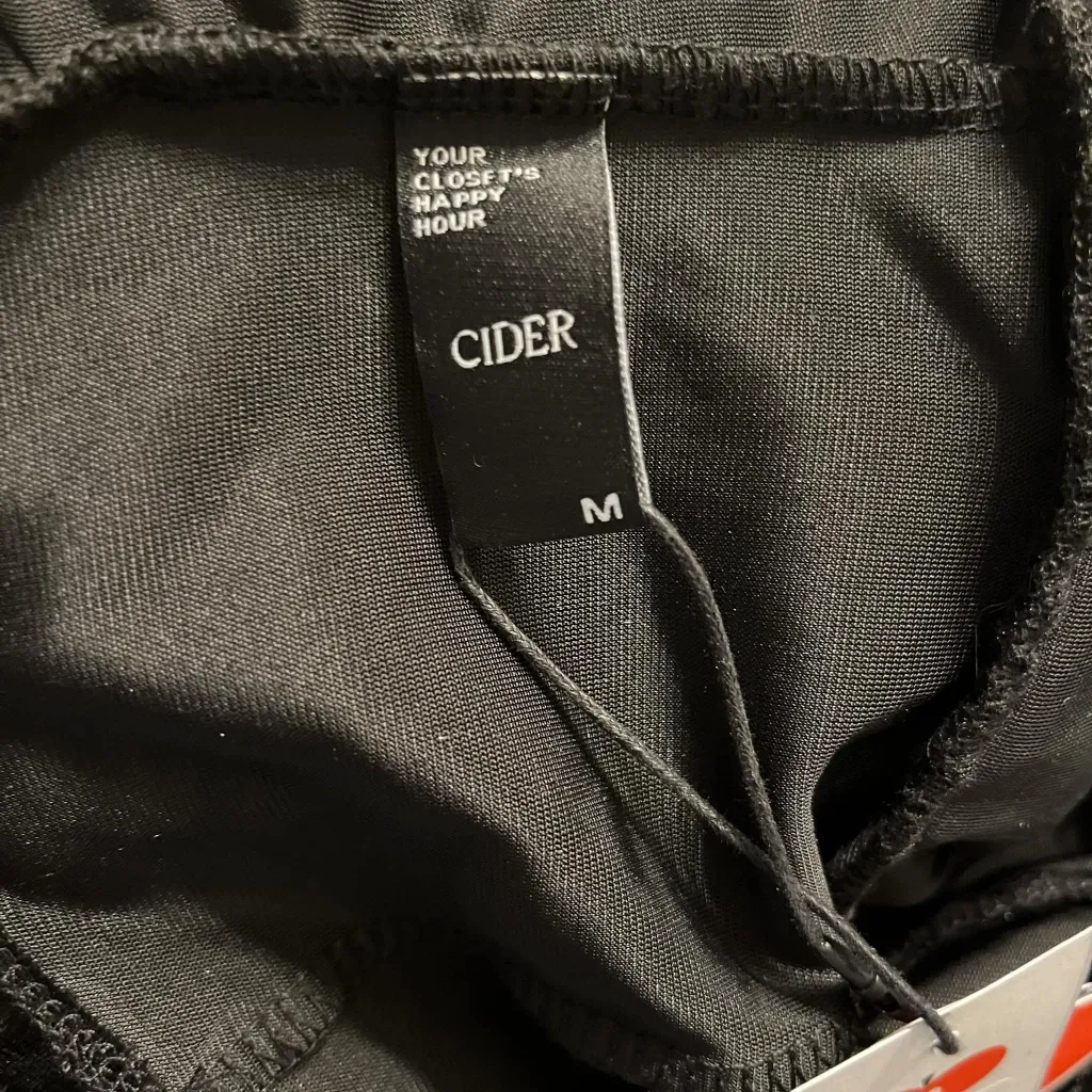 CiderVelvet Solid Strapless Ruffle Hem Medium Jumpsuit - Image 9