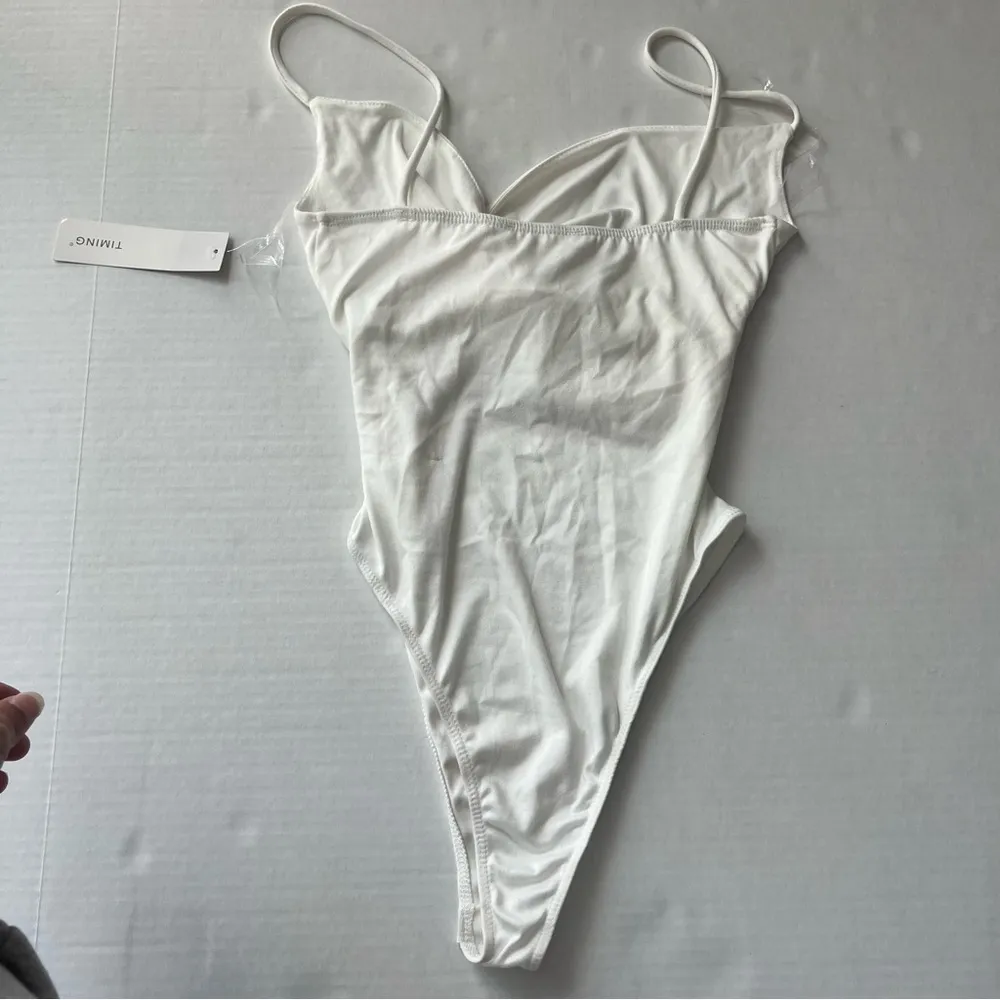 NWT  Spaghetti strap twist front bodysuit small ivory - Image 3