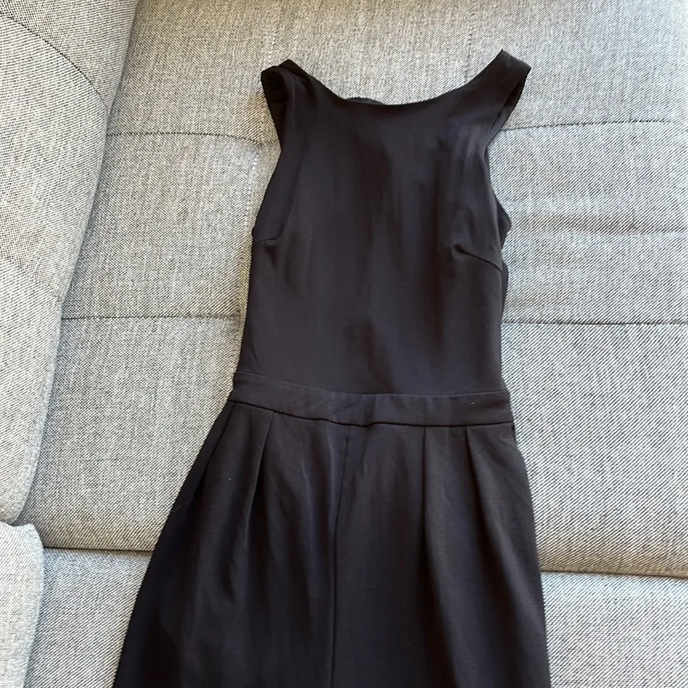 Black slack one piece jumpsuit with elegant back - Image 2