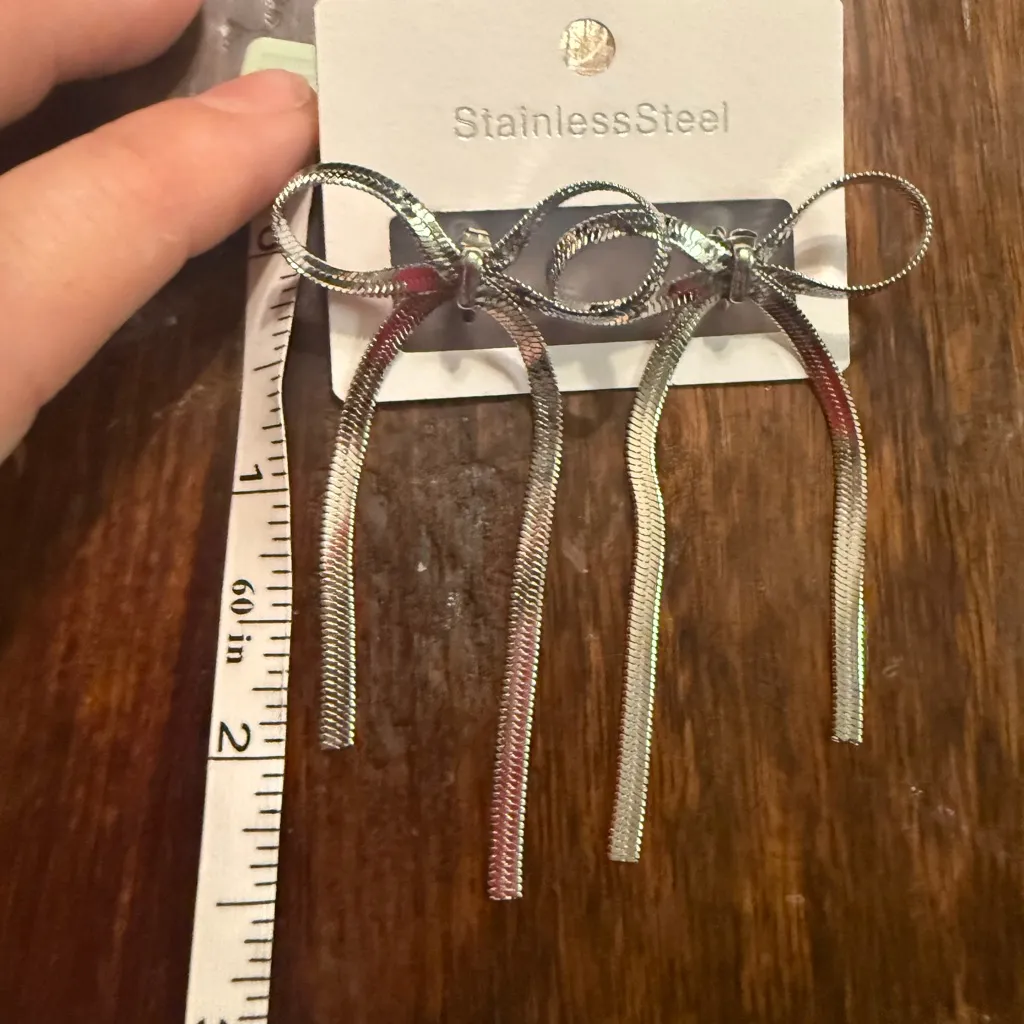 Elegant Silver Bow Drop Earrings – Stainless Steel - Image 2