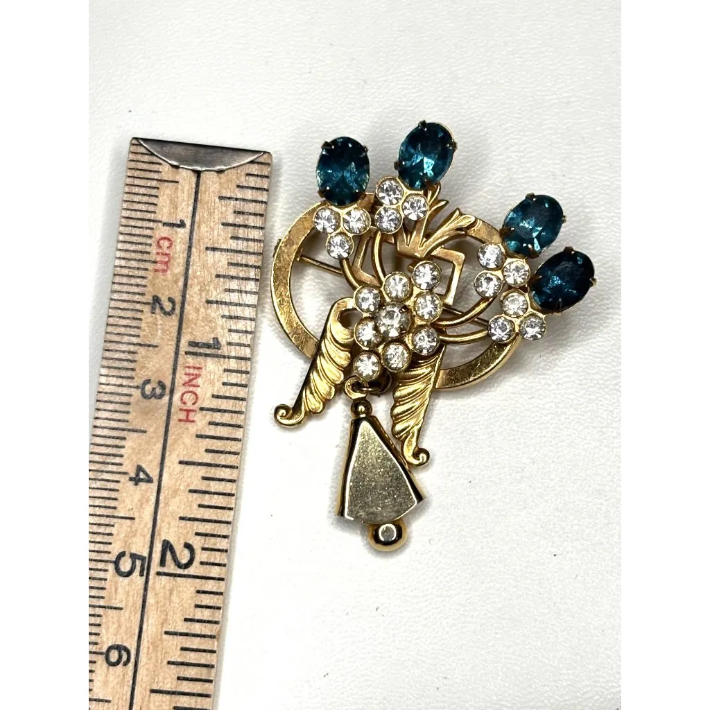 Vintage Gold Tone Rhinestone Brooch With Blue & Clear Stones - Image 4