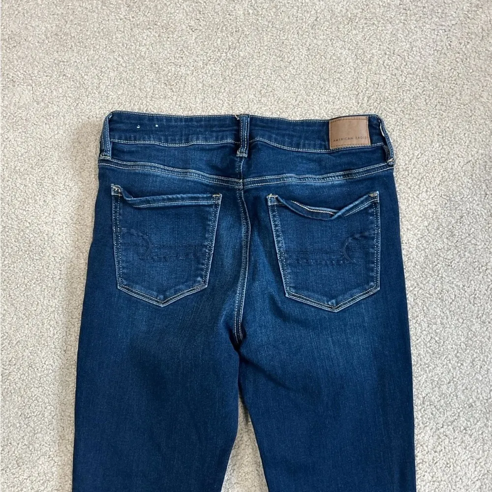 American eagle next level stretch dark wash solid blue jeans in size 10 long - Image 4