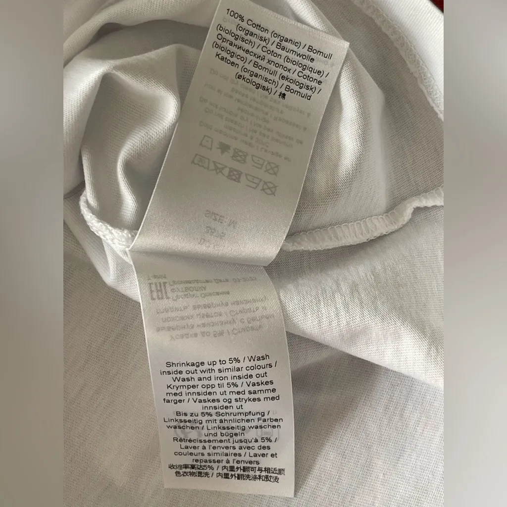 Ganni White Tee with Blue and Pink Design

"Excellent Preowned
Condition" - Image 10