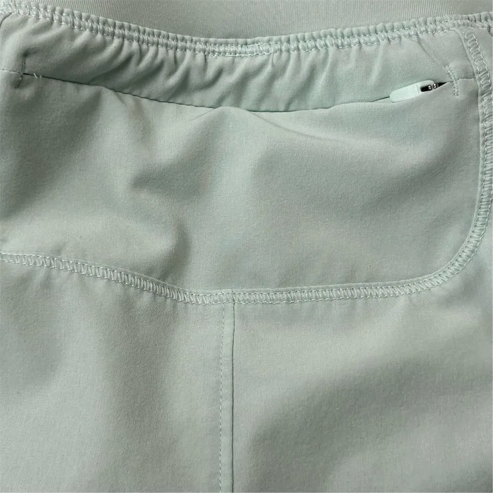 Under Armour Women's HeatGear Running Shorts Green Size M - Image 8