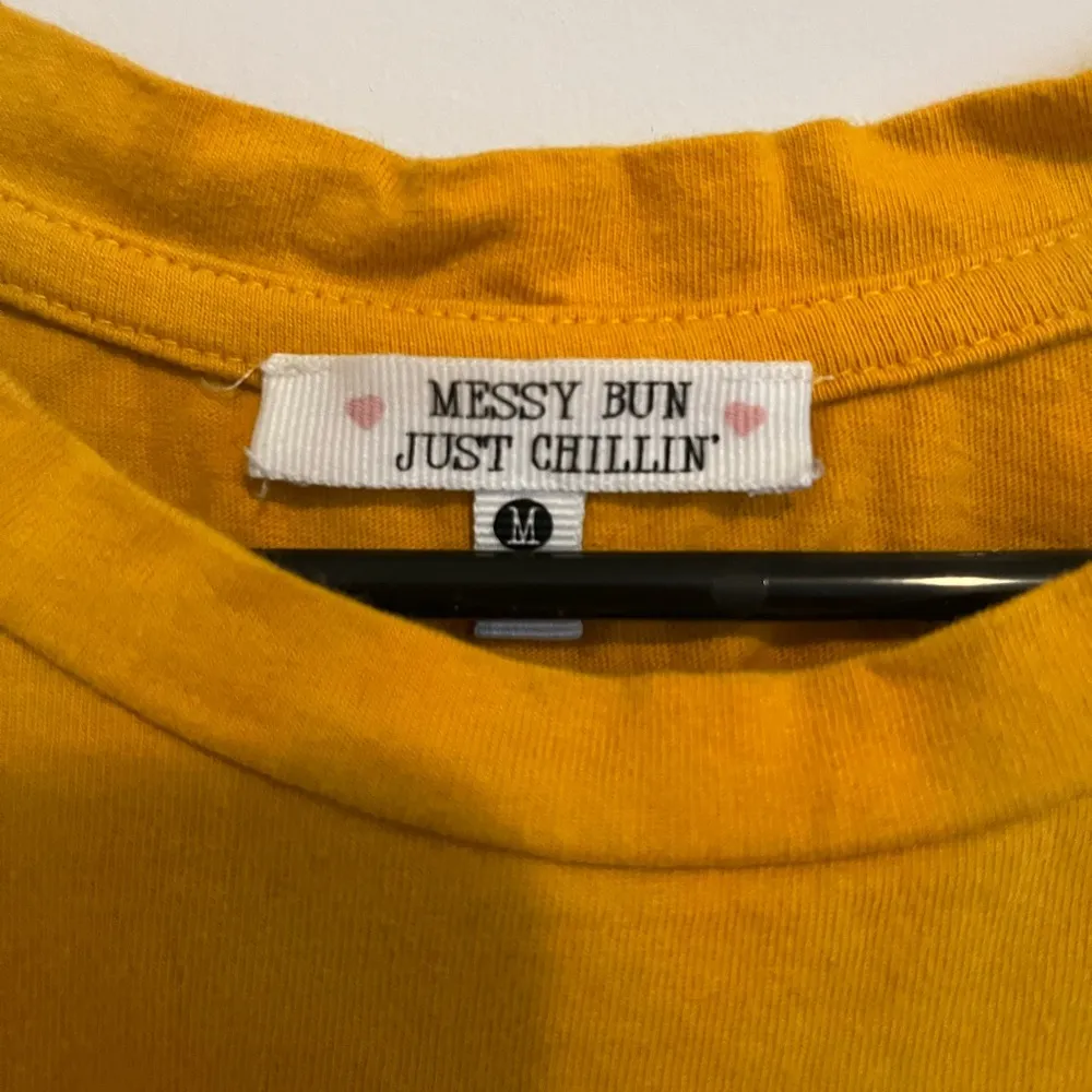 Marshall’s mustard yellow T shirt. - Image 4
