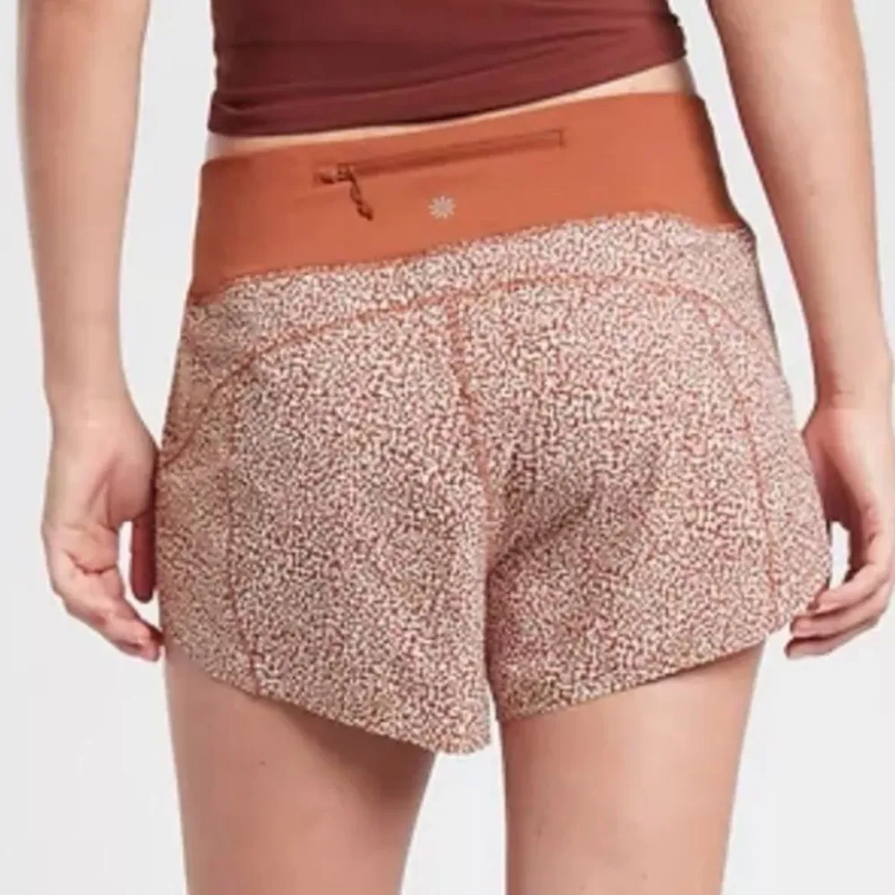 Athleta  Run With It Printed‎ 3.5" Shorts XS Cheetah Rust Orange - Image 8