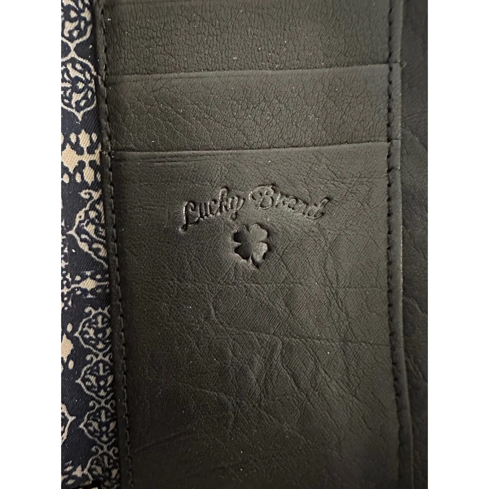 Lucky Brand black leather zip-around wallet with a gold plate detail - Image 7