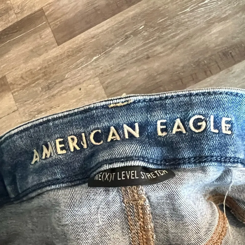 American Eagle Next Level Stretch Curvy High Rise Shortie Distressed Denim Short - Image 6