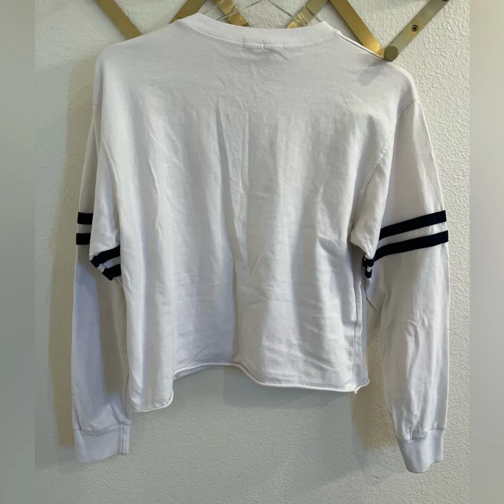 Brandy Melville John Galt Embroidered Flag Varsity Cropped Long Sleeve Top White - Image 7